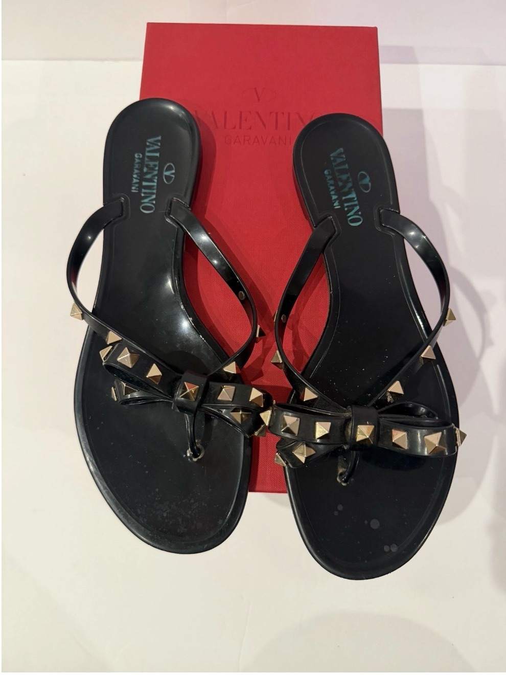 Valentino Black Jelly Thong Sandals With Gold Rockstuds